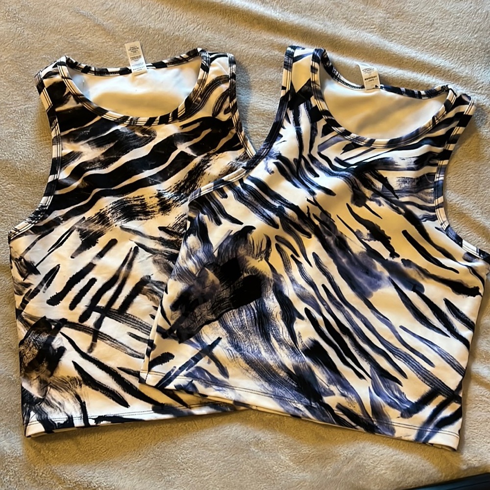 Selling as a bundle . No tags but NEVER WORN… great condition. Athletic tops